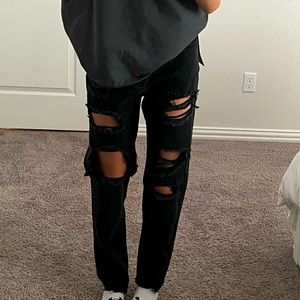 washed black extreme distressed black jean